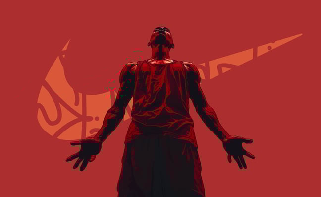 michael jordan standing with arms wide with a nike symbol in the background