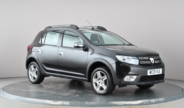 2019 Dacia Sandero Stepway in black color displayed in a showroom with rotating 360-degree view