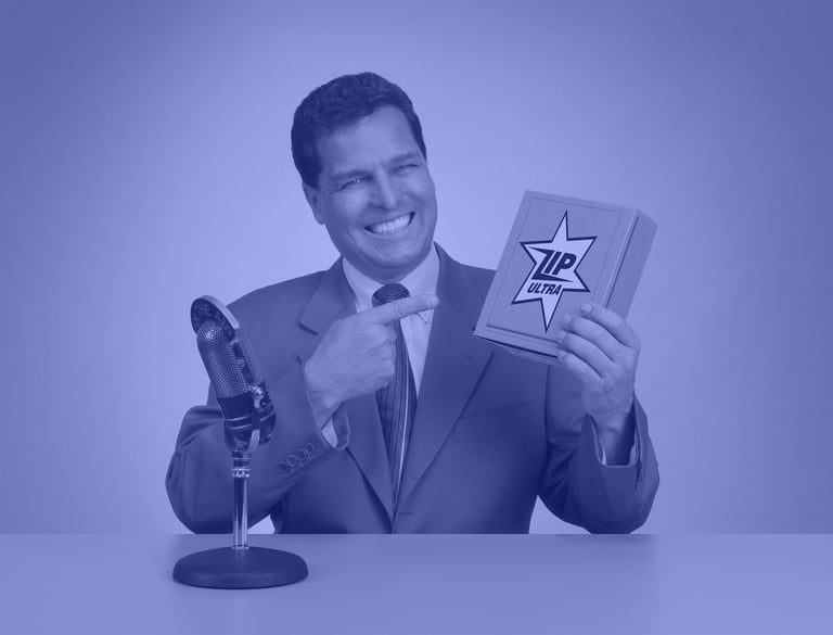 man in suit holding book